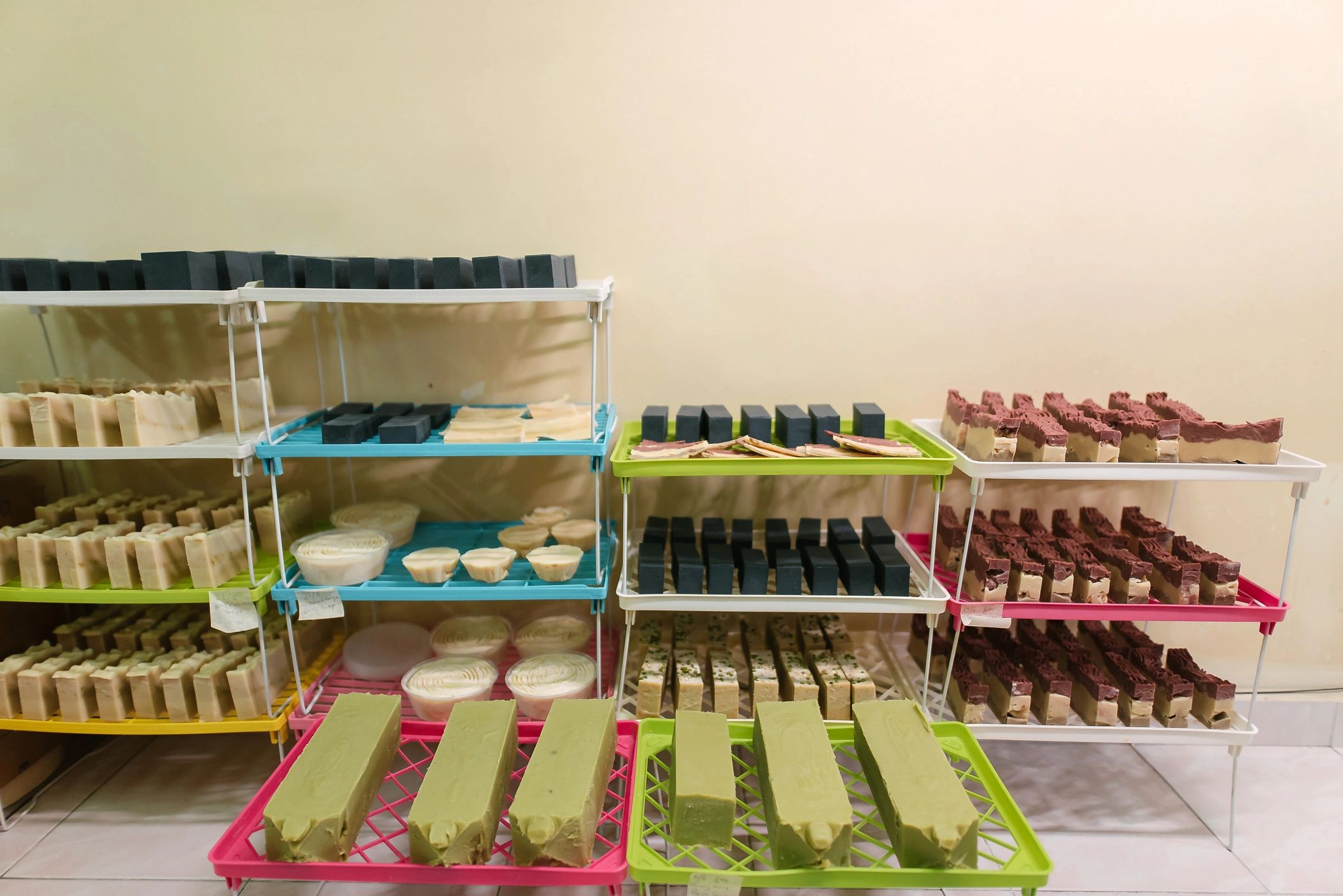Handmade soaps curing on a tray